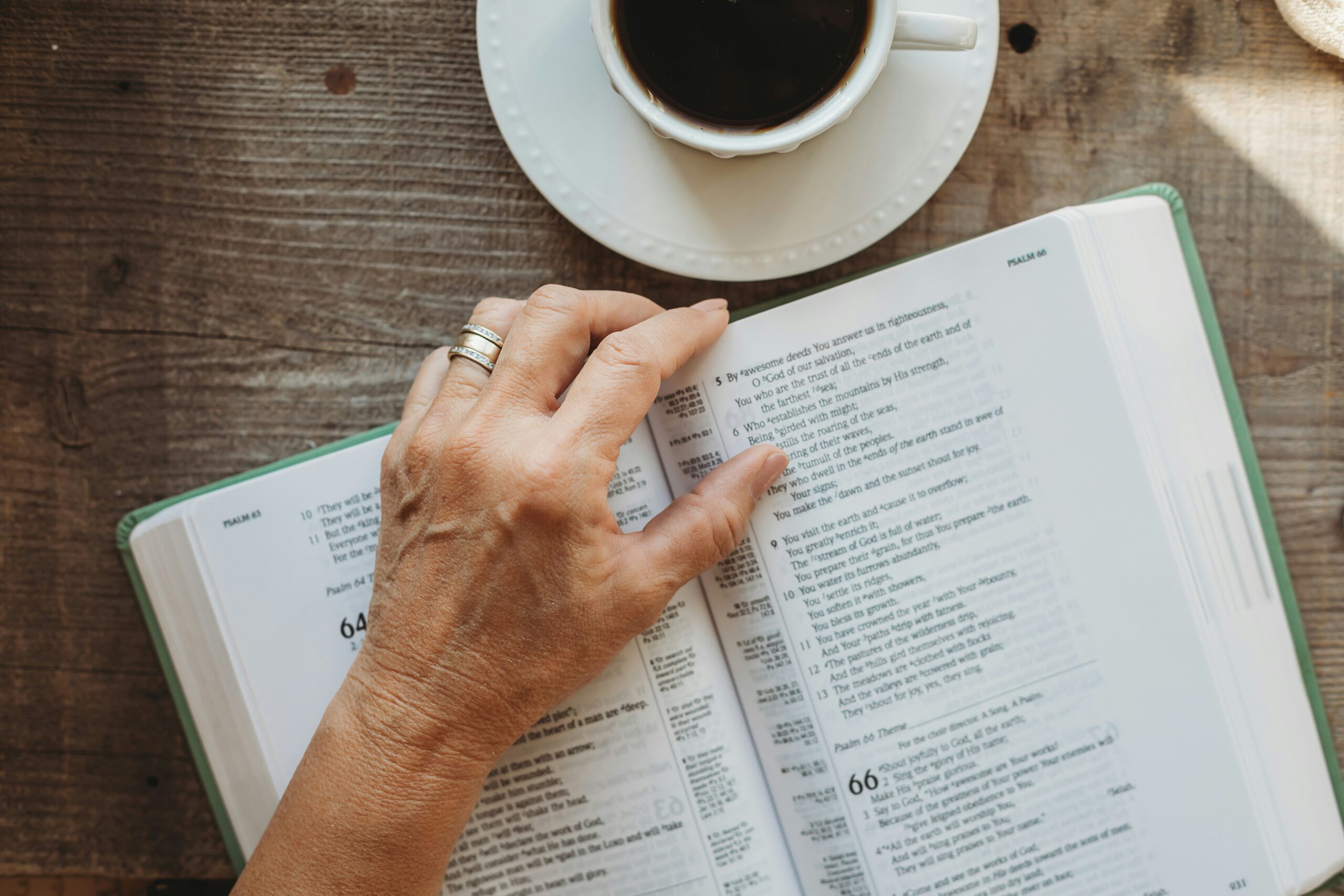 Person Reading Bible on ways to top Abortion scaled 1